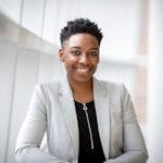 Woman Wearing Gray Notch Lapel Suit Jacket